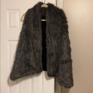 A faux fur dark gray/brown/black vest
